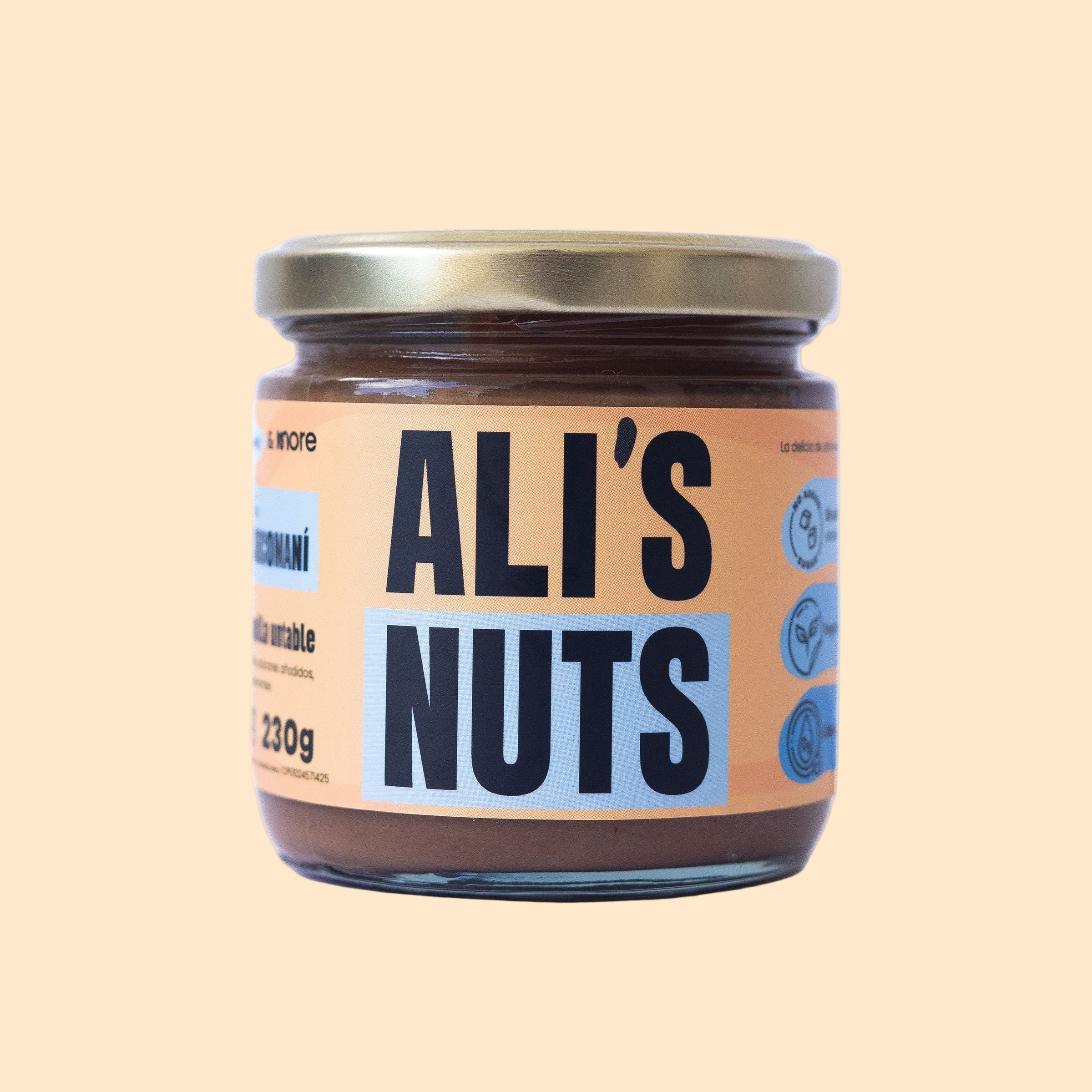 Frasco de crema ChocoManí Ali’s Nuts con etiqueta color durazno y tapa dorada sobre fondo blanco